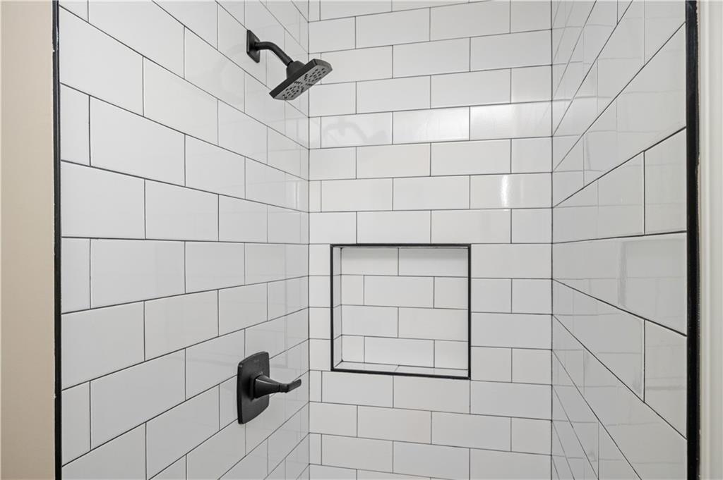 3850 Beya Way Atlanta, GA 30340 - Photo 12 of 18 a bathroom with a shower