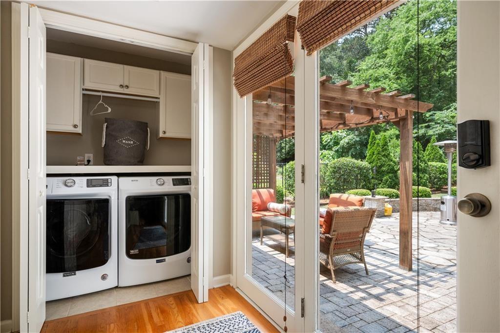 3850 Beya Way Atlanta, GA 30340 - Photo 16 of 18 a view of living room kitchen with a large window