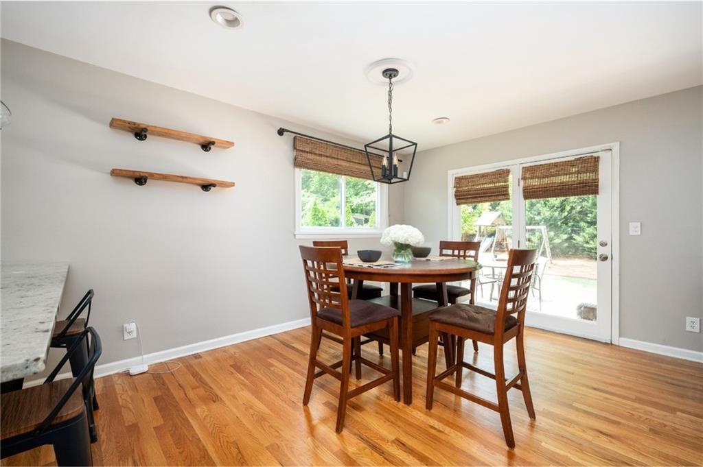 3850 Beya Way Atlanta, GA 30340 - Photo 7 of 18 a view of a dining room with furniture window and wooden floor