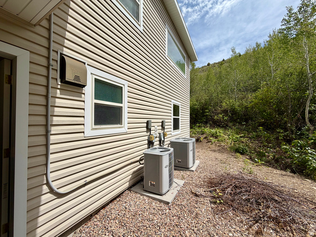 1133 Paris Canyon Road Paris, ID 83261 - Photo 69 of 75 Exterior siding featuring two outdoor HVAC units on gravel ground cover