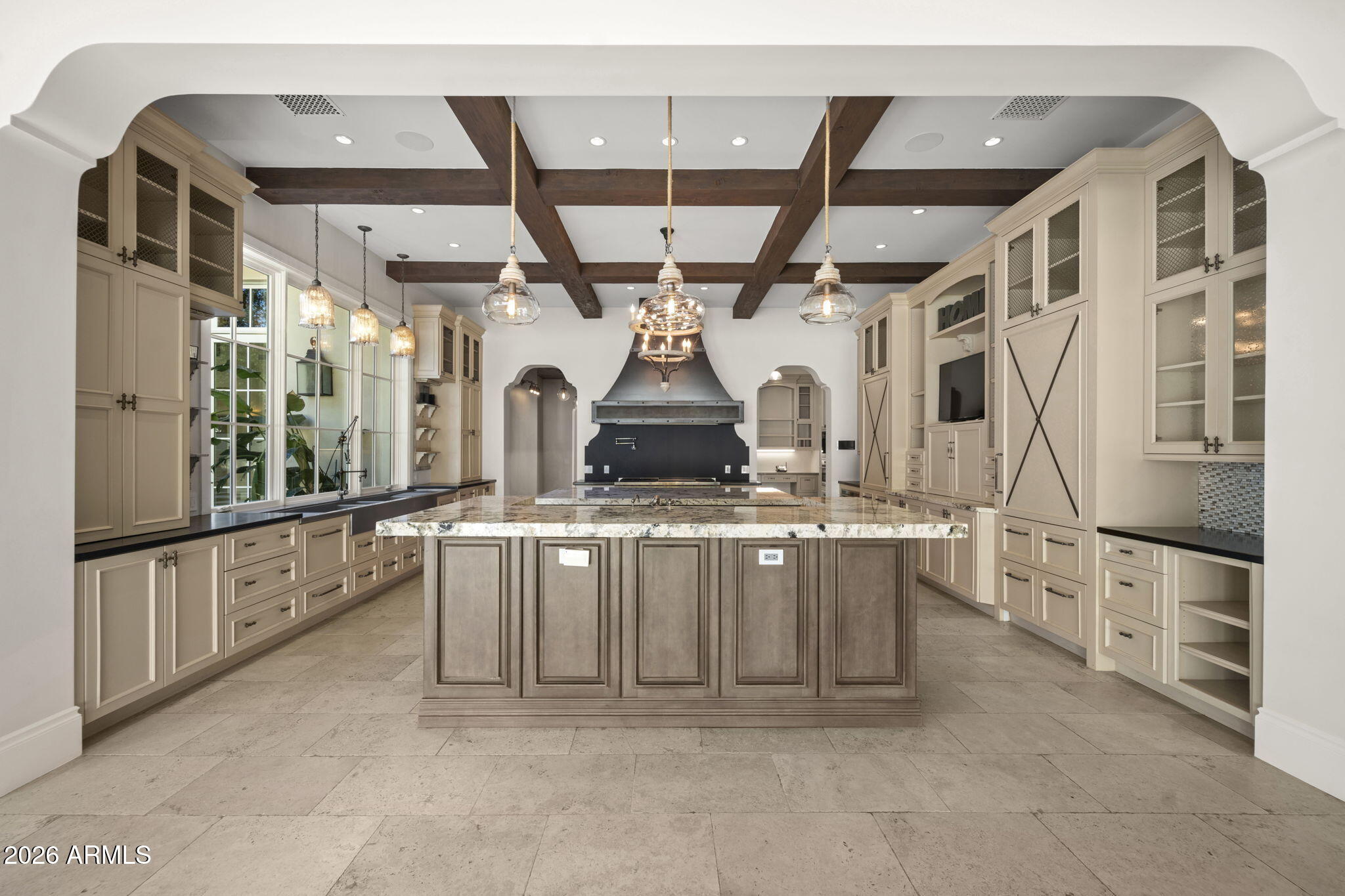 5402 East Exeter Boulevard Phoenix, AZ 85018 - Photo 20 of 110 a kitchen with stainless steel appliances granite countertop a stove and a refrigerator