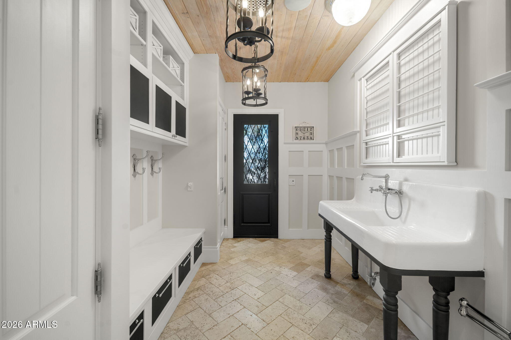 5402 East Exeter Boulevard Phoenix, AZ 85018 - Photo 35 of 110 a bathroom with a sink a mirror and a window