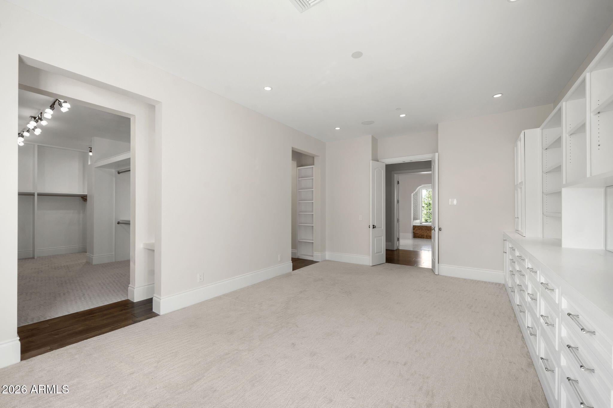 5402 East Exeter Boulevard Phoenix, AZ 85018 - Photo 69 of 110 an empty room with fan and mirror