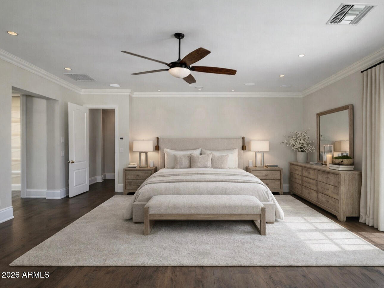 5402 East Exeter Boulevard Phoenix, AZ 85018 - Photo 72 of 110 a bedroom with a large bed and a chandelier