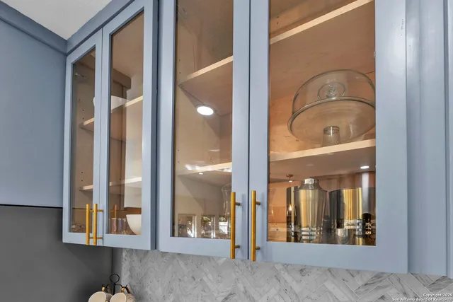 a spacious bedroom with a bed and ceiling fan