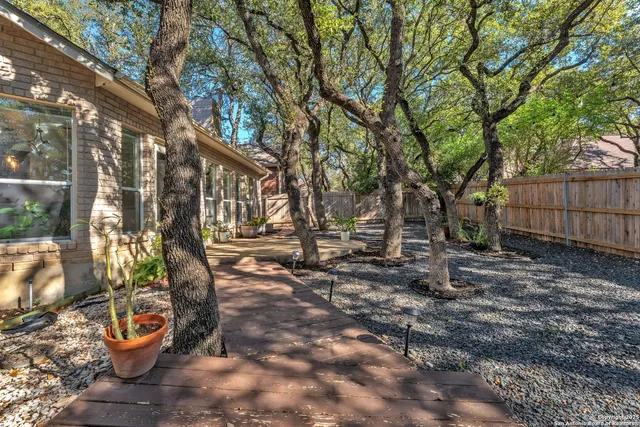 a view of a pathway with a yard