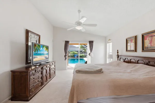 a bed room with a bed and a window