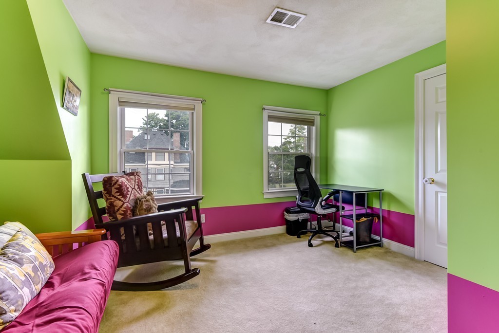 58 Webster Street, Unit 58 Newton, MA 02465 - Photo 20 of 28 a living room with furniture and a window