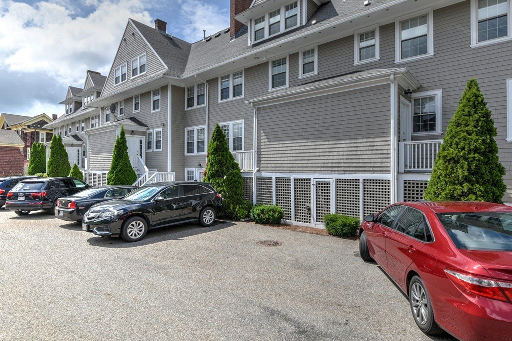 58 Webster Street, Unit 58 Newton, MA 02465 - Photo 26 of 28 a car parked in front of a house