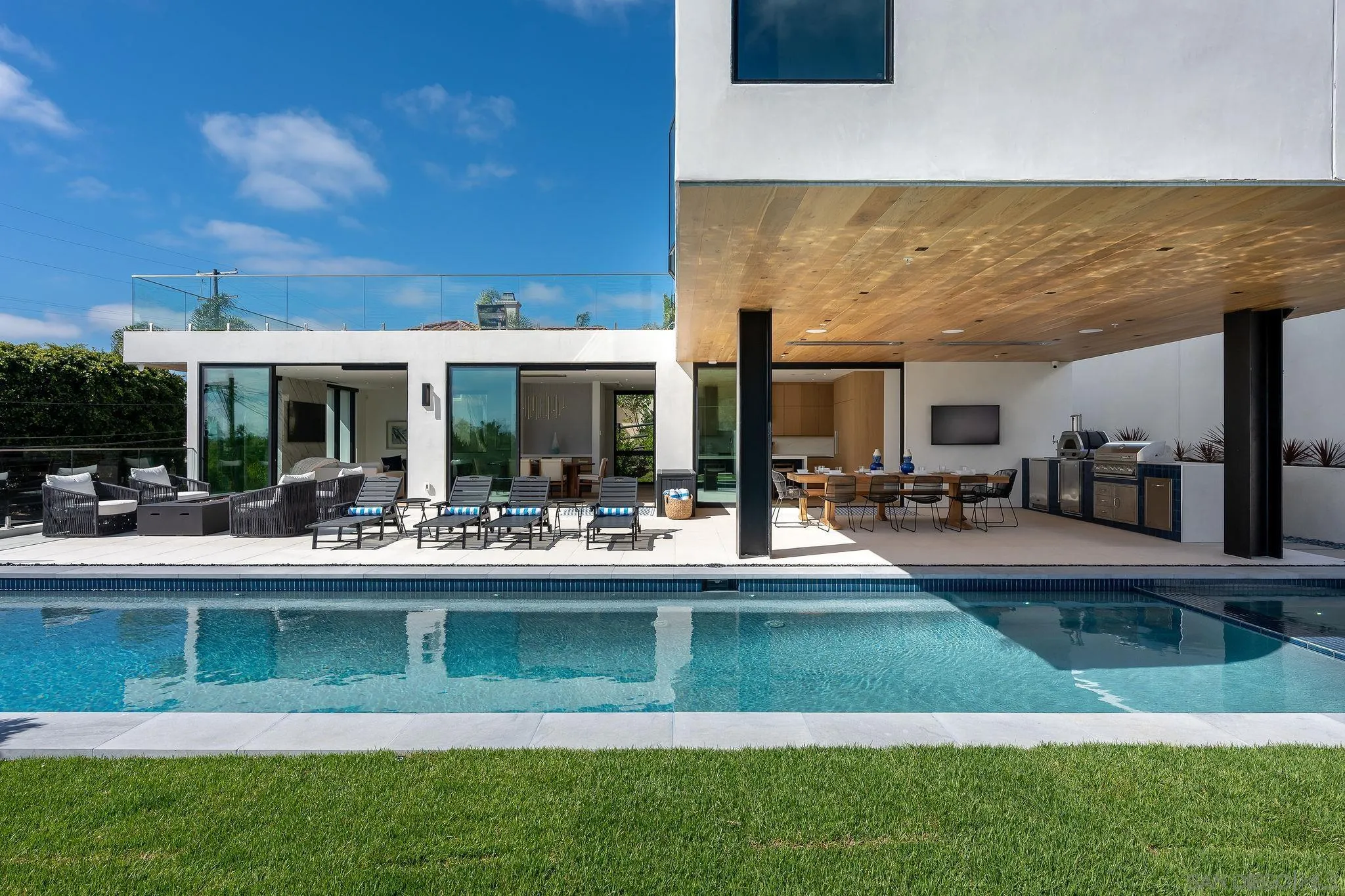 1605 Burgundy Road Encinitas, CA 92024 - Photo 3 of 39 a view of a swimming pool with outdoor seating
