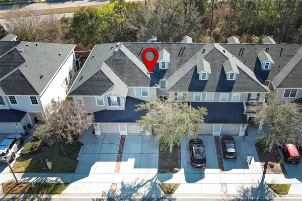 a view of dinning table and chairs in patio