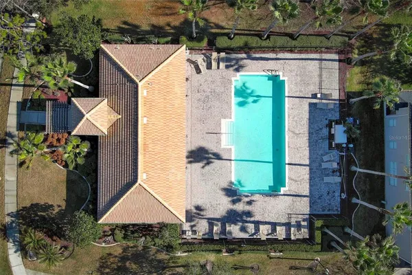 a view of a park with swings and slides