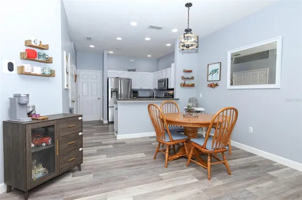a view of a dining room with furniture
