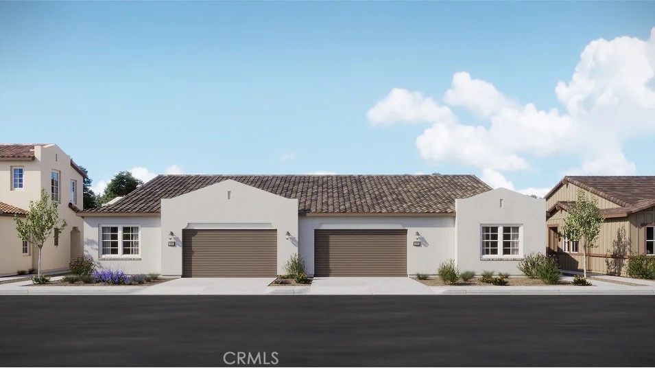 650 Furrow Road Rancho Mission Viejo, CA 92694 - Photo 12 of 22 a front view of a house with a yard