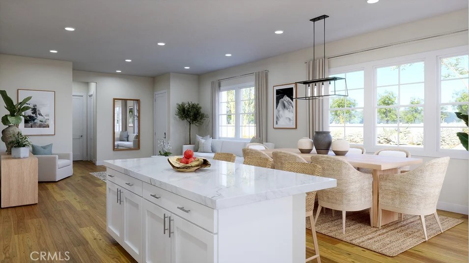 650 Furrow Road Rancho Mission Viejo, CA 92694 - Photo 2 of 22 a kitchen with stainless steel appliances granite countertop sink stove and refrigerator