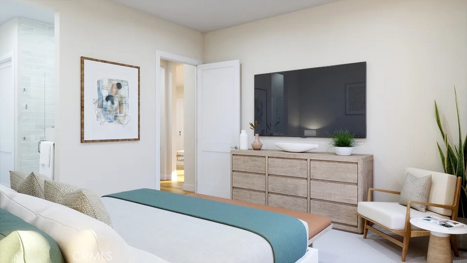 650 Furrow Road Rancho Mission Viejo, CA 92694 - Photo 8 of 22 a bedroom with a bed and a flat screen tv