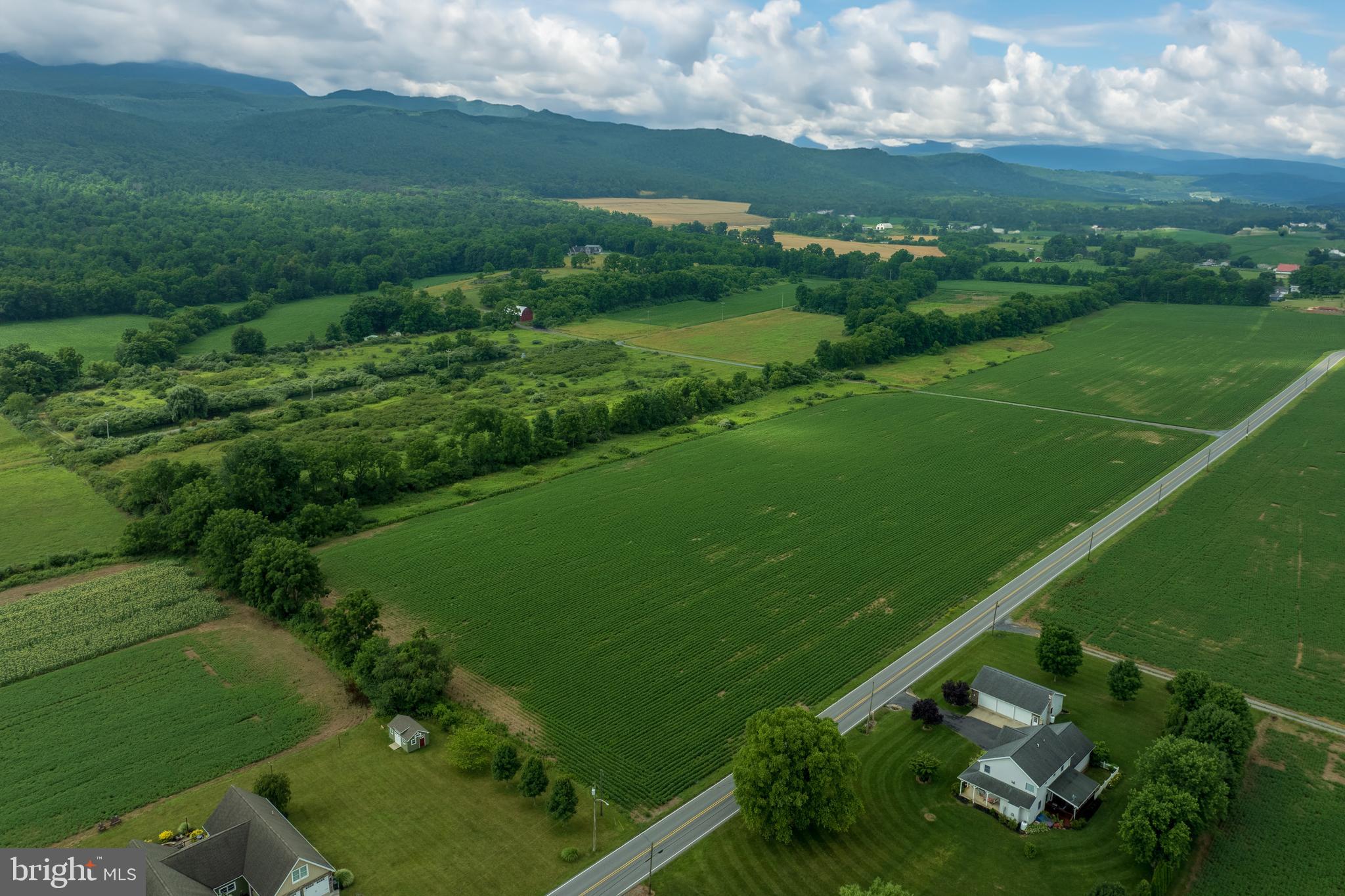 0 Hublersburg Road, Unit ENTIRETY Bellefonte, PA 16823 - Photo 11 of 58 an aerial view of a houses with outdoor space and street view