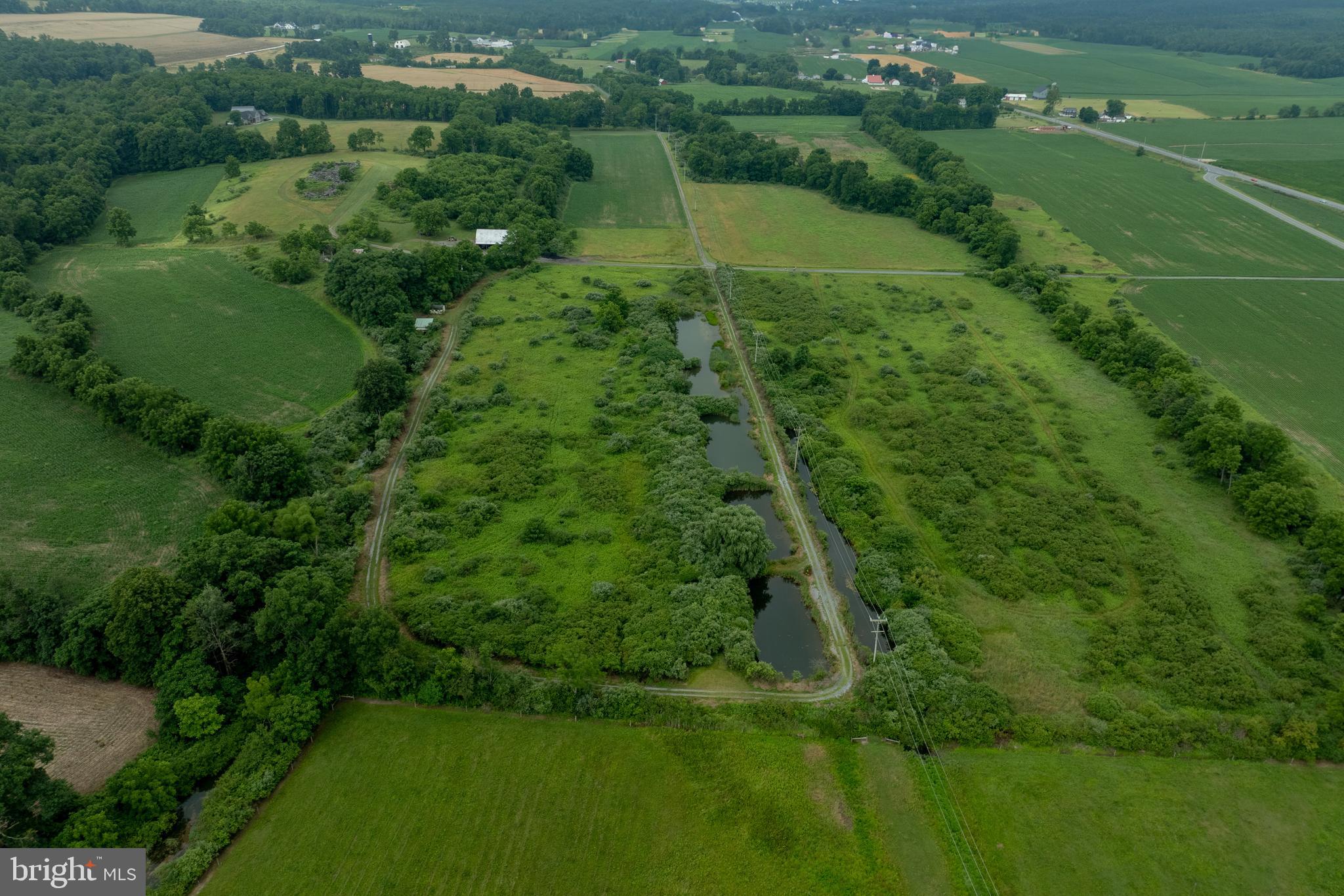 0 Hublersburg Road, Unit ENTIRETY Bellefonte, PA 16823 - Photo 12 of 58 an aerial view of residential houses with outdoor space and trees