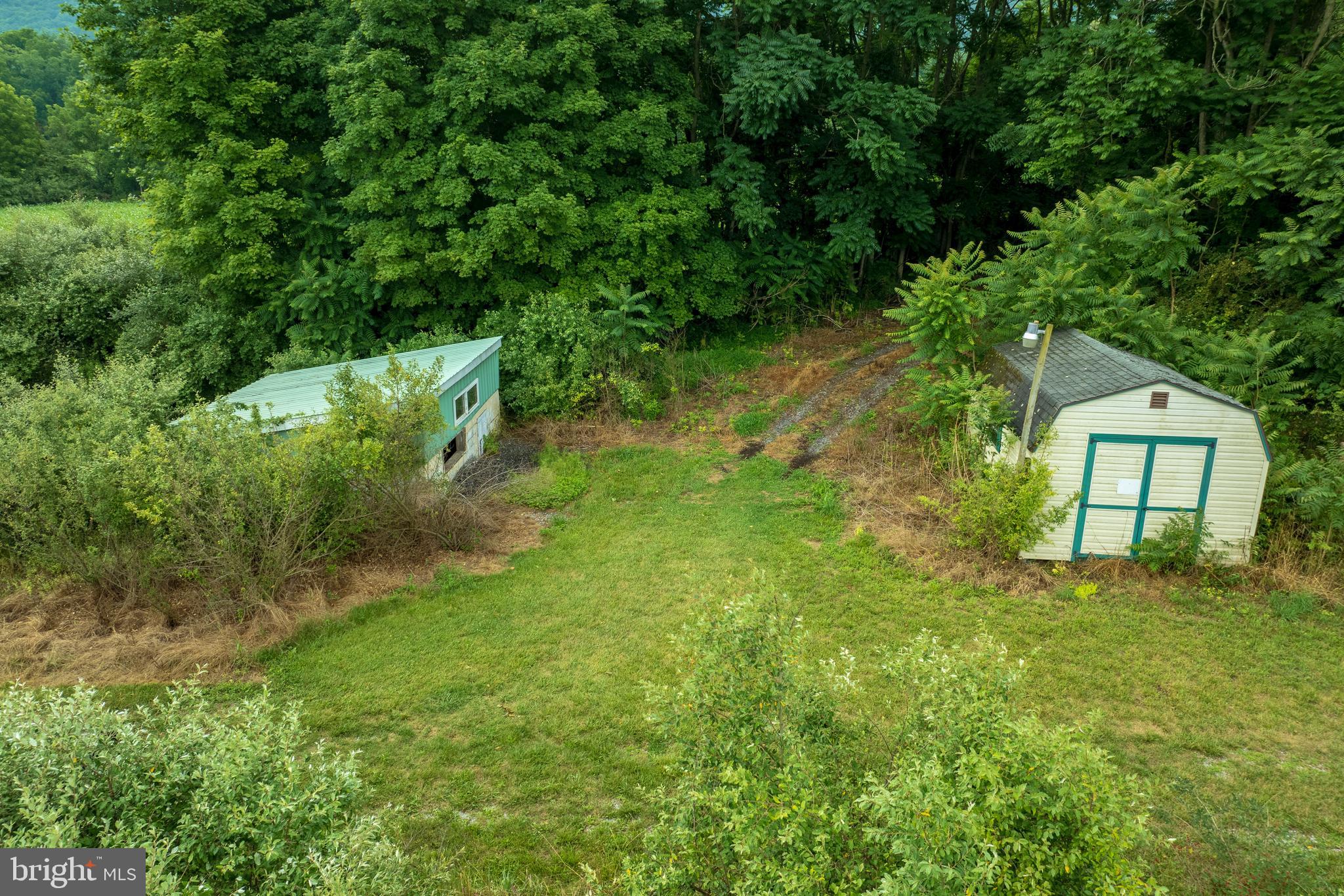 0 Hublersburg Road, Unit ENTIRETY Bellefonte, PA 16823 - Photo 16 of 58 a backyard of a house with lots of green space