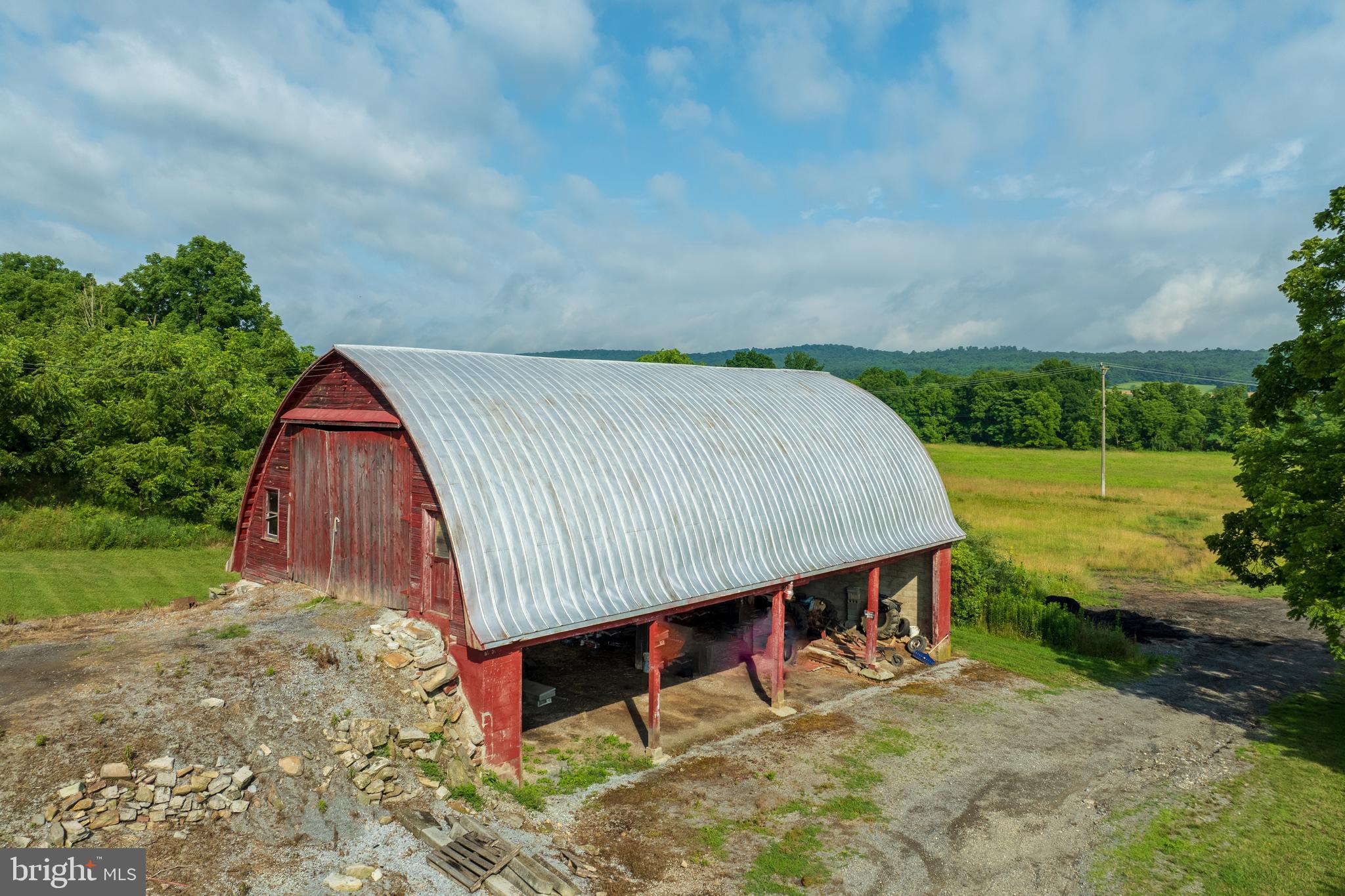 0 Hublersburg Road, Unit ENTIRETY Bellefonte, PA 16823 - Photo 2 of 58 a view of backyard with a barn and a cactus plant