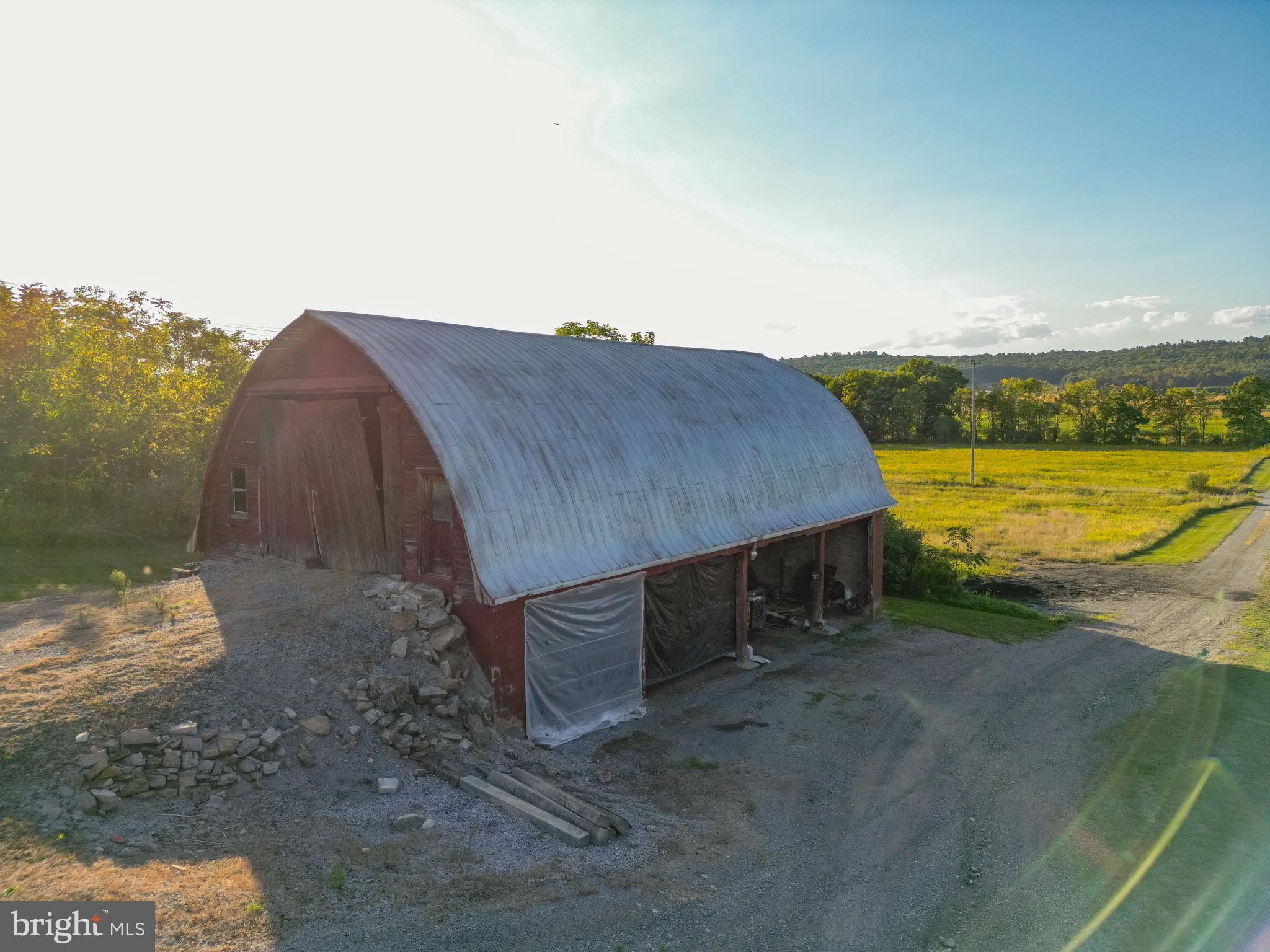 0 Hublersburg Road, Unit ENTIRETY Bellefonte, PA 16823 - Photo 25 of 58 a view of a lake with a mountain