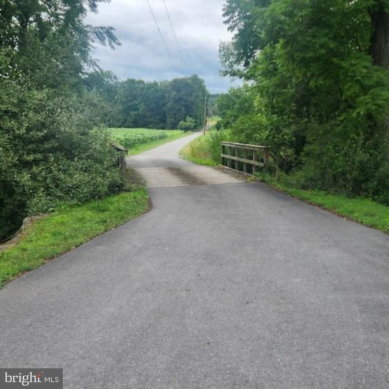 0 Hublersburg Road, Unit ENTIRETY Bellefonte, PA 16823 - Photo 39 of 58 a view of a field with trees in the background