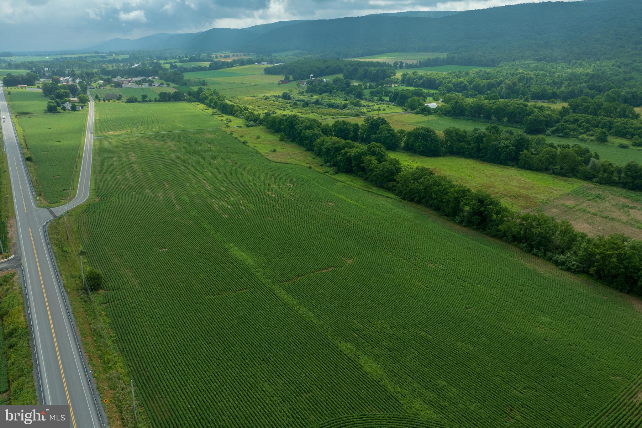 0 Hublersburg Road, Unit ENTIRETY Bellefonte, PA 16823 - Photo 9 of 58 a view of a green field with sitting space