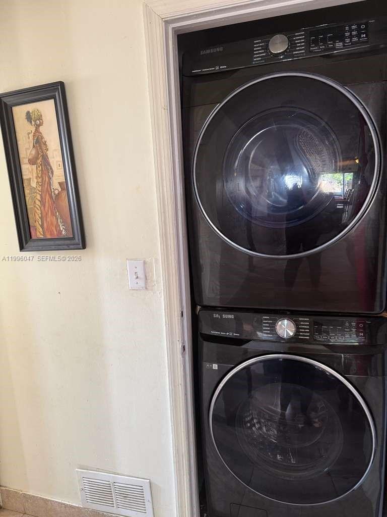 7477 Northwest 167th Street Hialeah, FL 33015 - Photo 24 of 24 a close up view of washer and dryer