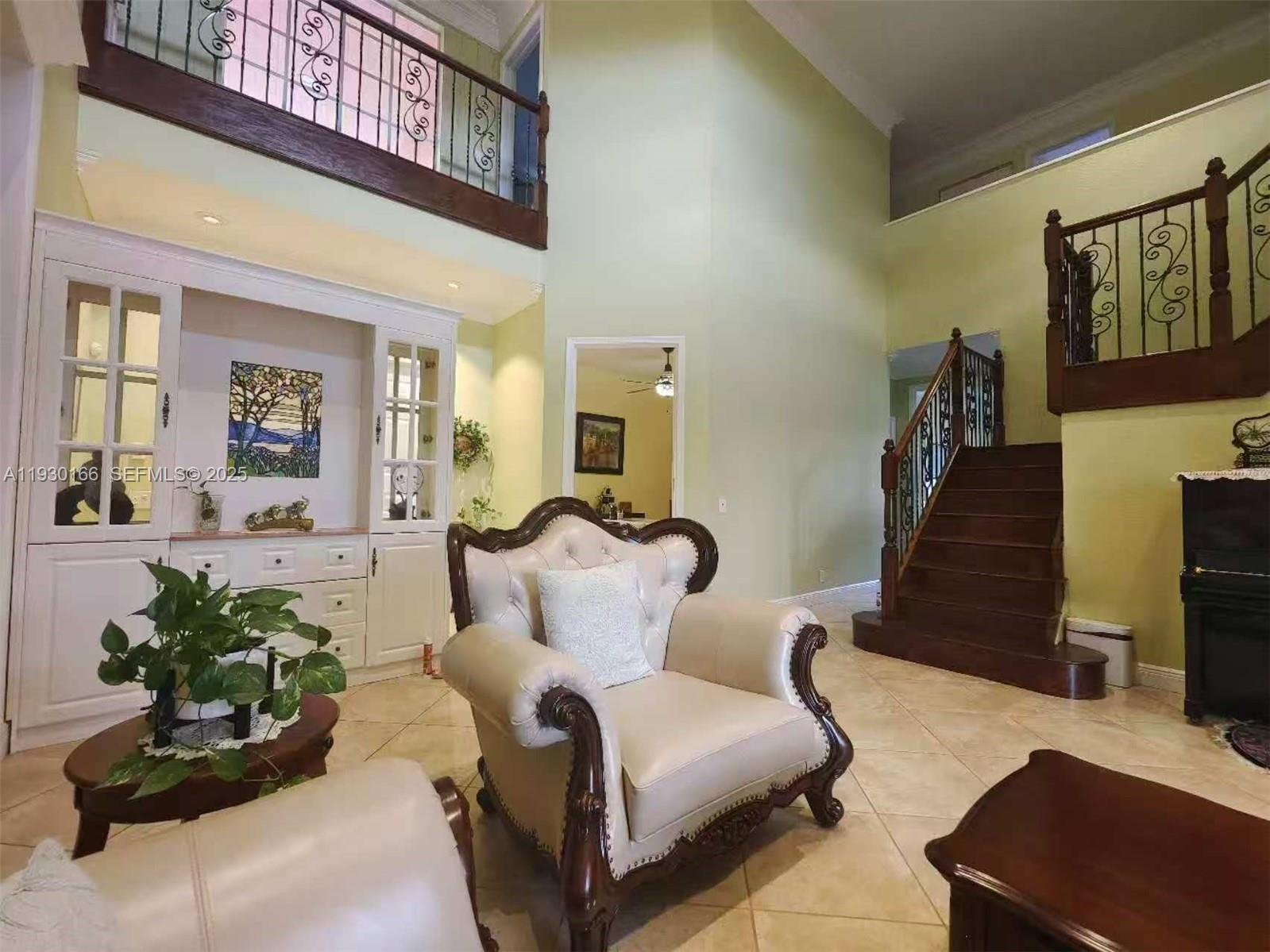 1035 Waterside Circle Weston, FL 33327 - Photo 37 of 40 a living room with furniture