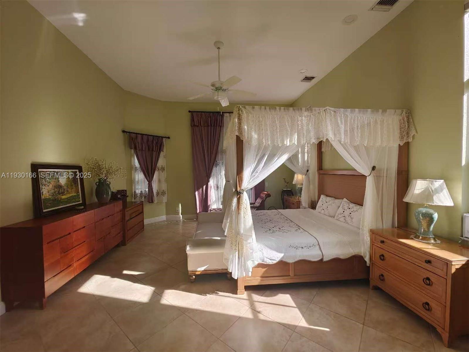 1035 Waterside Circle Weston, FL 33327 - Photo 39 of 40 a bedroom with bed and window