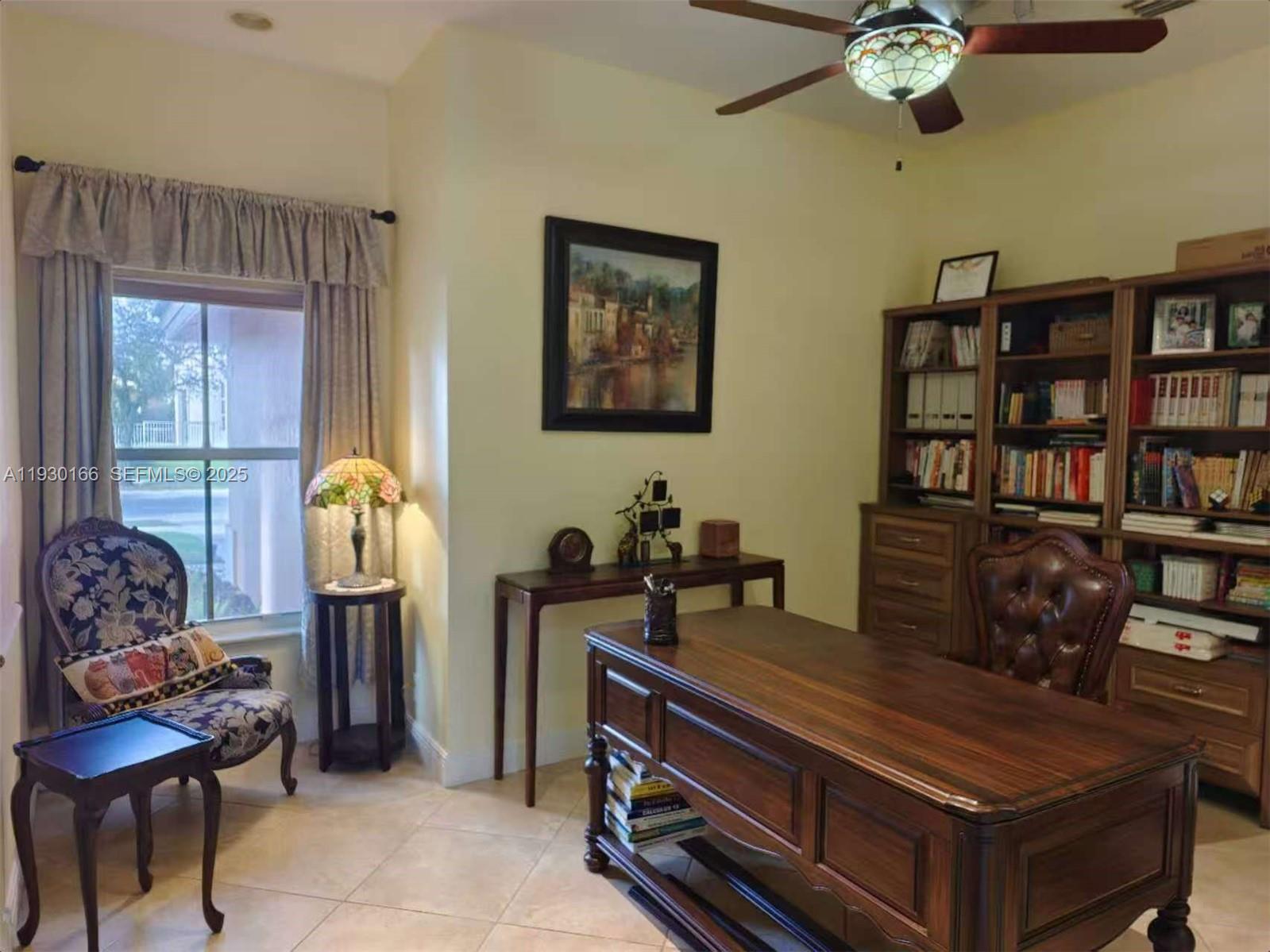 1035 Waterside Circle Weston, FL 33327 - Photo 4 of 40 a living room with furniture and decor