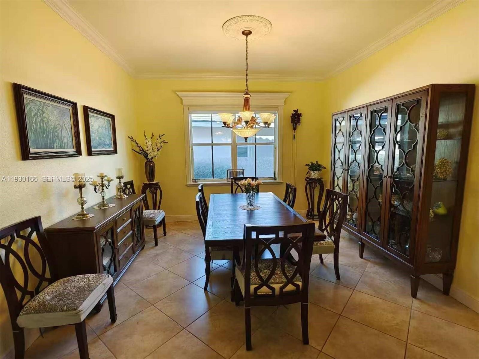 1035 Waterside Circle Weston, FL 33327 - Photo 6 of 40 a view of a dining room with furniture window and outside view