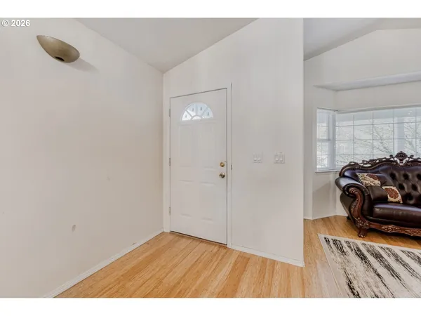 a view of a livingroom with wooden floor
