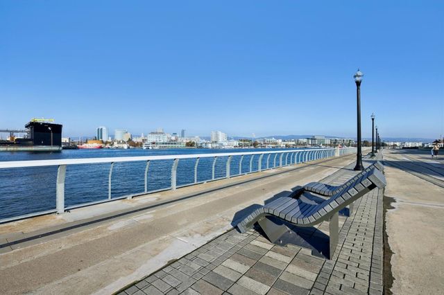 a view of a brick building with a yard