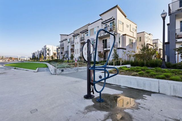 a sign on the side of a street