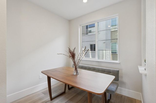 a view of a workspace with furniture