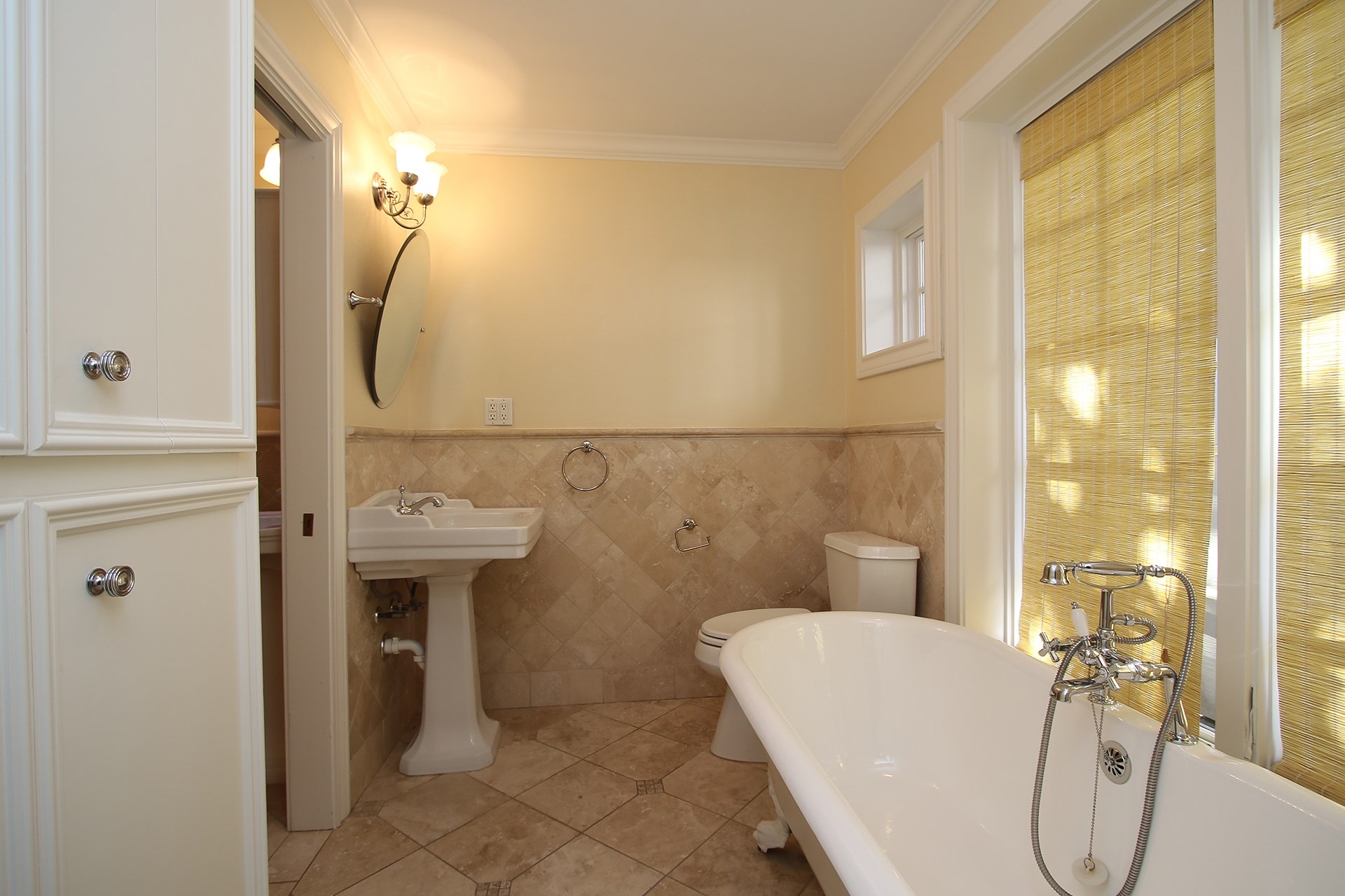 6208 Kirby Drive Houston, TX 77005 - Photo 13 of 19 a bathroom with a sink a toilet and shower