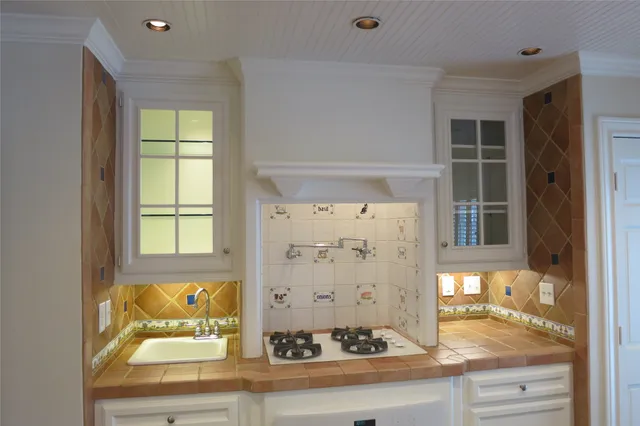 view of kitchen with wooden floor and window