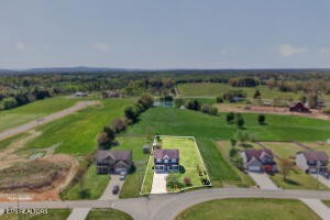 338 Pistole Road Sparta, TN 38583 - Photo 35 of 39 an aerial view of lake and residential houses with outdoor space
