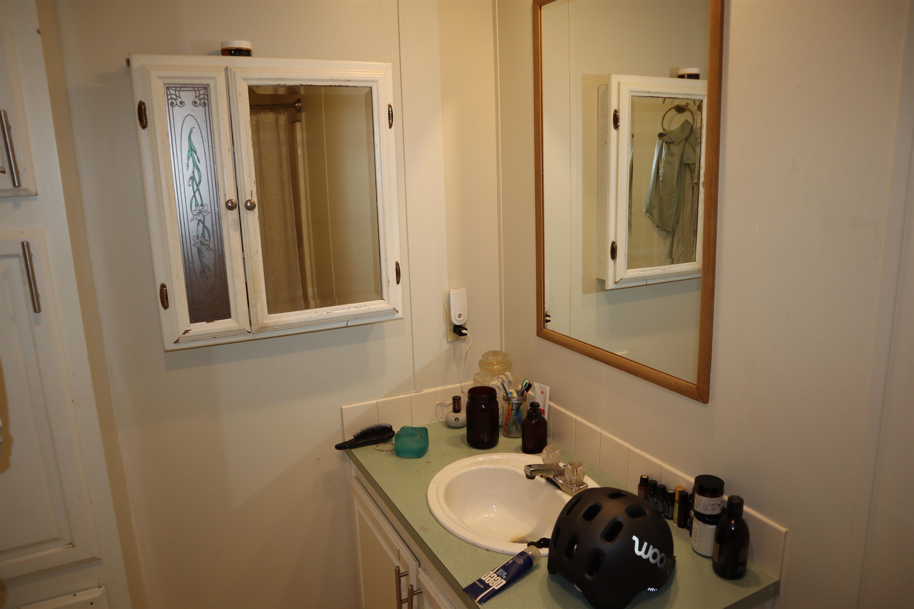 193 Fairground Road Quincy, CA 95971 - Photo 11 of 20 a bathroom with a sink and a mirror
