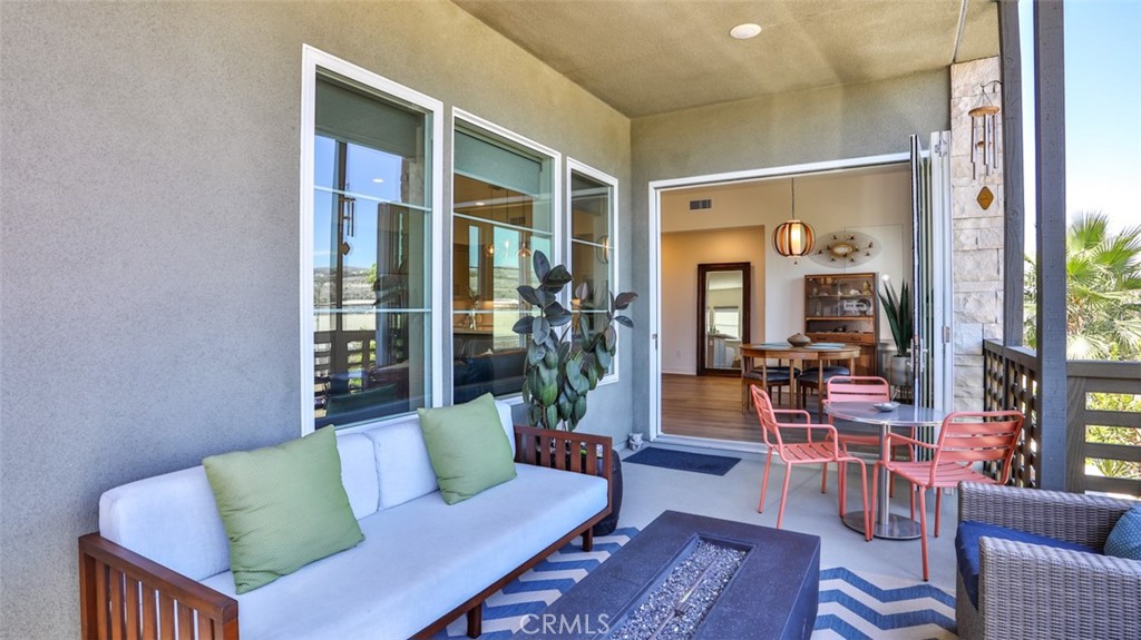 1207 Doheny Way Dana Point, CA 92629 - Photo 7 of 74 a living room with furniture and a potted plant