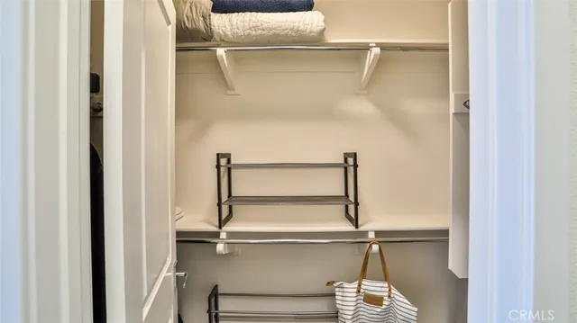 a bathroom with a double vanity sink and mirror