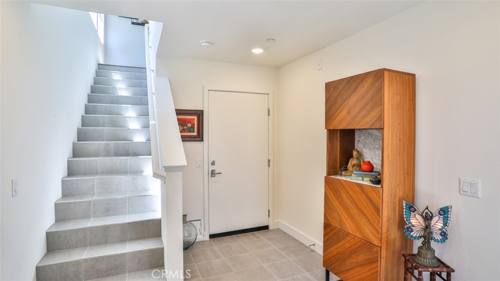 1207 Doheny Way Dana Point, CA 92629 - Photo 5 of 74 Foyer off of front patio and direct access from attached 3-car garage.
