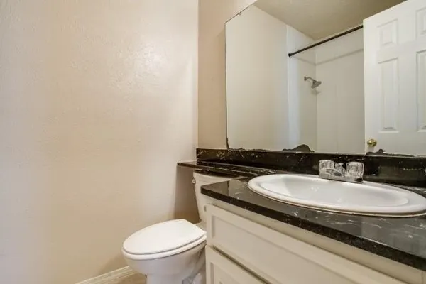 a bathroom with a sink and a toilet