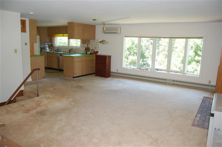 10 Nickerson Road Eastham, MA 02642 - Photo 16 of 24 an empty room with kitchen view and appliances