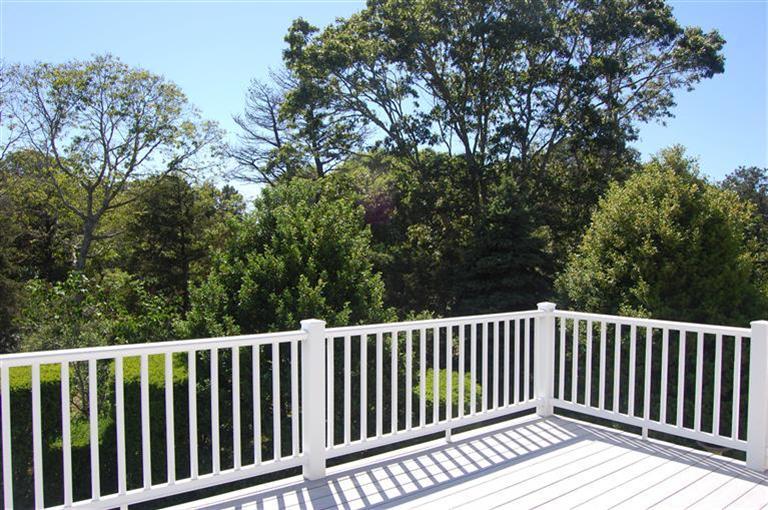 10 Nickerson Road Eastham, MA 02642 - Photo 10 of 24 a balcony with wooden floor and fence