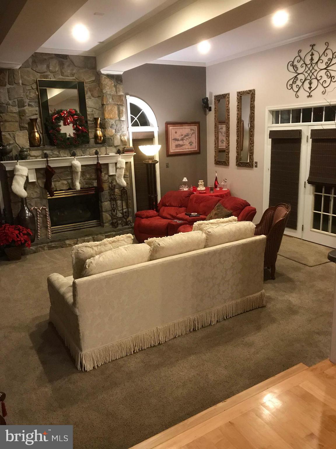 8575 Indian Springs Road Frederick, MD 21702 - Photo 14 of 15 a living room with furniture and a flat screen tv