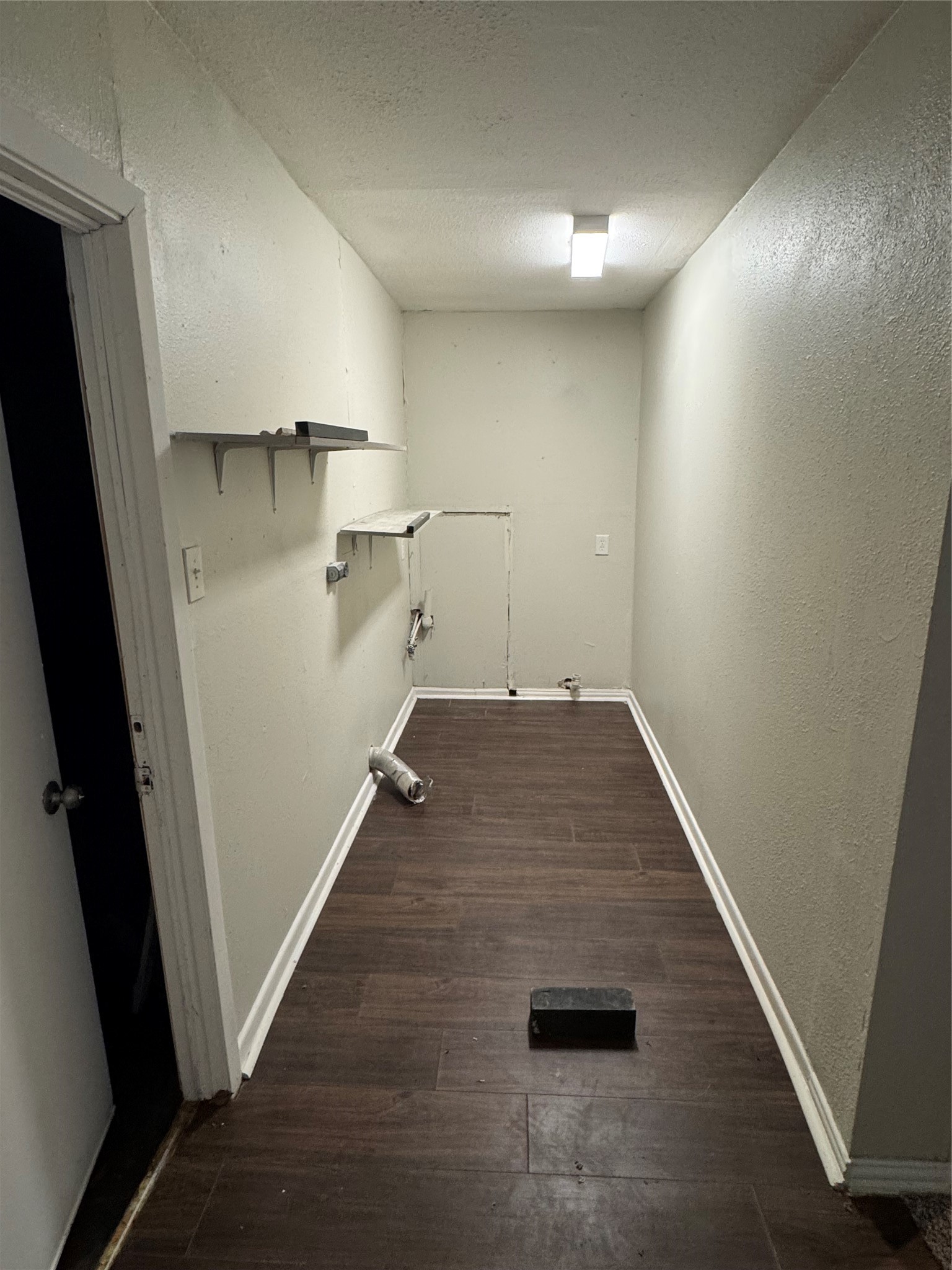 2522 Jackson La Marque, TX 77568 - Photo 12 of 18 en empty room with wooden floor and window