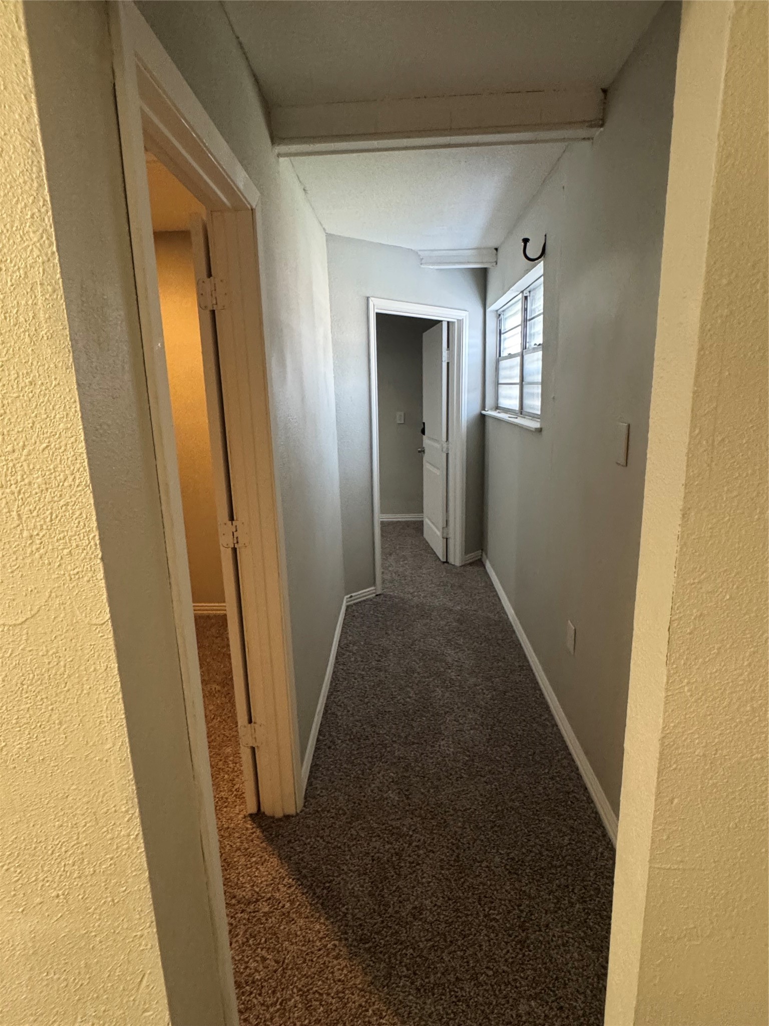 2522 Jackson La Marque, TX 77568 - Photo 13 of 18 a view of hallway with windows