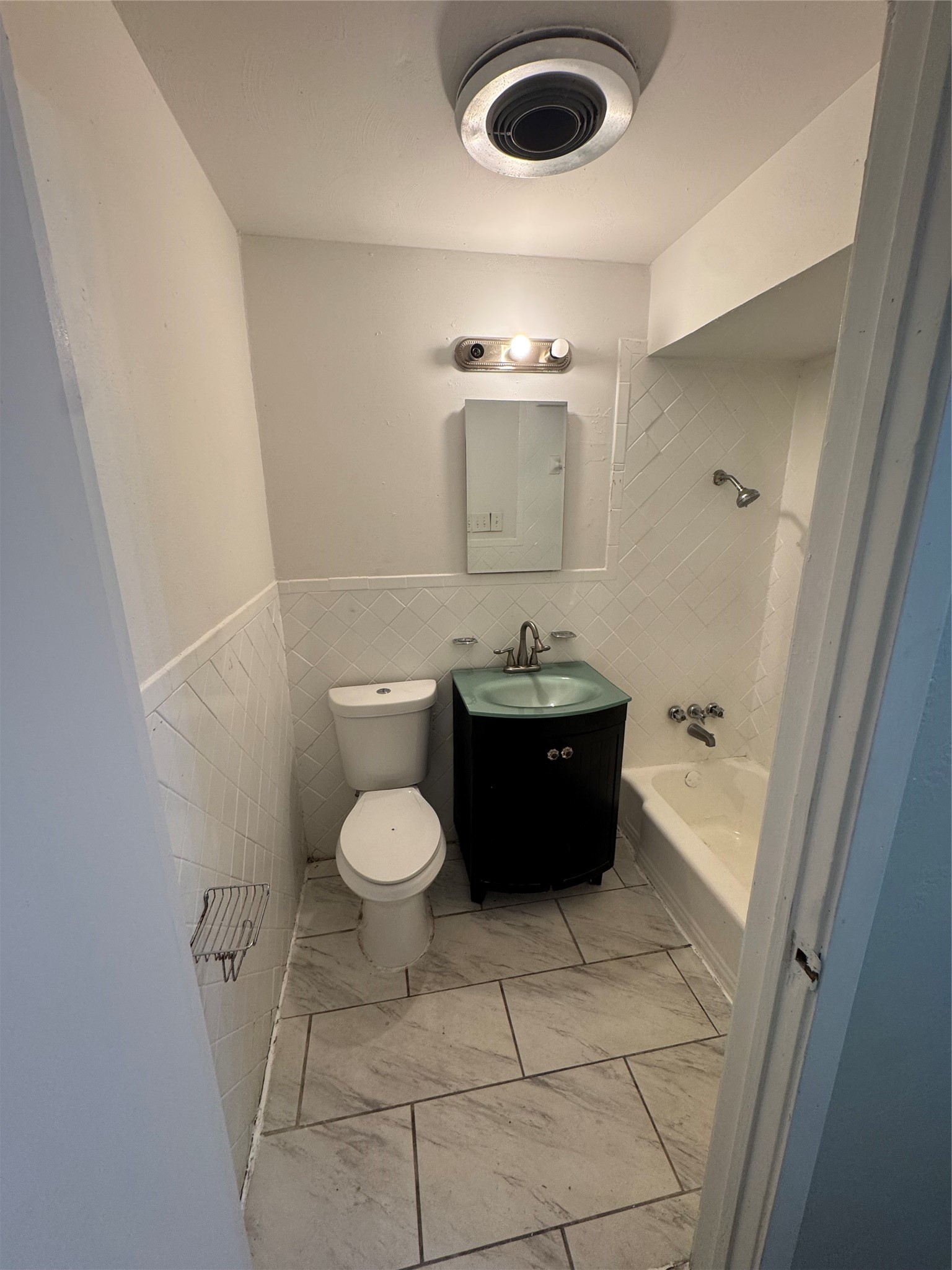 2522 Jackson La Marque, TX 77568 - Photo 10 of 18 a bathroom with a sink and a toilet